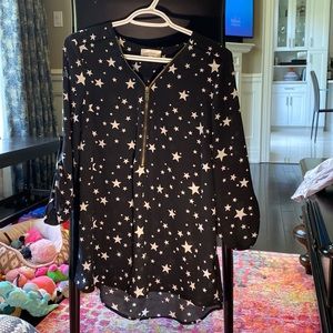 Light weight front zip blouse with stars